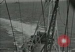 Image of bombarding Pacific Ocean, 1944, second 18 stock footage video 65675024983