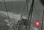 Image of bombarding Pacific Ocean, 1944, second 23 stock footage video 65675024983