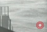 Image of Landing Ships Medium (rocket) fire their batteries at Okinawa  Okinawa Ryukyu Islands, 1945, second 16 stock footage video 65675024986