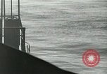 Image of Landing Ships Medium (rocket) fire their batteries at Okinawa  Okinawa Ryukyu Islands, 1945, second 21 stock footage video 65675024986