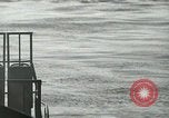 Image of Landing Ships Medium (rocket) fire their batteries at Okinawa  Okinawa Ryukyu Islands, 1945, second 23 stock footage video 65675024986