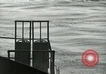 Image of Landing Ships Medium (rocket) fire their batteries at Okinawa  Okinawa Ryukyu Islands, 1945, second 28 stock footage video 65675024986