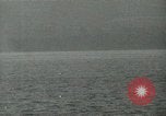 Image of Landing Ships Medium (rocket) fire their batteries at Okinawa  Okinawa Ryukyu Islands, 1945, second 33 stock footage video 65675024986