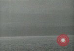 Image of Landing Ships Medium (rocket) fire their batteries at Okinawa  Okinawa Ryukyu Islands, 1945, second 34 stock footage video 65675024986