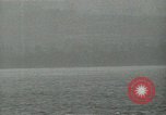 Image of Landing Ships Medium (rocket) fire their batteries at Okinawa  Okinawa Ryukyu Islands, 1945, second 36 stock footage video 65675024986