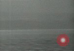 Image of Landing Ships Medium (rocket) fire their batteries at Okinawa  Okinawa Ryukyu Islands, 1945, second 37 stock footage video 65675024986