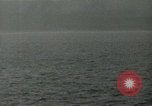 Image of Landing Ships Medium (rocket) fire their batteries at Okinawa  Okinawa Ryukyu Islands, 1945, second 38 stock footage video 65675024986
