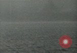 Image of Landing Ships Medium (rocket) fire their batteries at Okinawa  Okinawa Ryukyu Islands, 1945, second 39 stock footage video 65675024986