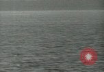 Image of Landing Ships Medium (rocket) fire their batteries at Okinawa  Okinawa Ryukyu Islands, 1945, second 45 stock footage video 65675024986