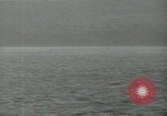 Image of Landing Ships Medium (rocket) fire their batteries at Okinawa  Okinawa Ryukyu Islands, 1945, second 46 stock footage video 65675024986