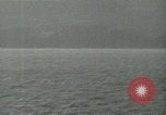 Image of Landing Ships Medium (rocket) fire their batteries at Okinawa  Okinawa Ryukyu Islands, 1945, second 47 stock footage video 65675024986