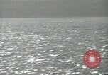 Image of Landing Ships Medium (rocket) fire their batteries at Okinawa  Okinawa Ryukyu Islands, 1945, second 52 stock footage video 65675024986