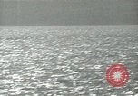 Image of Landing Ships Medium (rocket) fire their batteries at Okinawa  Okinawa Ryukyu Islands, 1945, second 53 stock footage video 65675024986