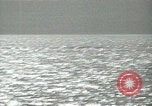 Image of Landing Ships Medium (rocket) fire their batteries at Okinawa  Okinawa Ryukyu Islands, 1945, second 54 stock footage video 65675024986