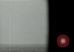 Image of Landing Ships Medium (rocket) fire their batteries at Okinawa  Okinawa Ryukyu Islands, 1945, second 62 stock footage video 65675024986