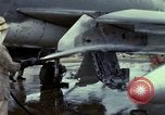Image of Vietnamese contractor personnel clean F-100D airplane Vietnam, 1966, second 18 stock footage video 65675024991