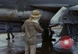Image of Vietnamese contractor personnel clean F-100D airplane Vietnam, 1966, second 20 stock footage video 65675024991