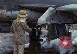Image of Vietnamese contractor personnel clean F-100D airplane Vietnam, 1966, second 22 stock footage video 65675024991