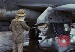 Image of Vietnamese contractor personnel clean F-100D airplane Vietnam, 1966, second 23 stock footage video 65675024991