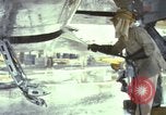 Image of Vietnamese contractor personnel clean F-100D airplane Vietnam, 1966, second 29 stock footage video 65675024991