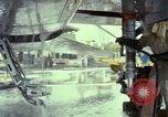 Image of Vietnamese contractor personnel clean F-100D airplane Vietnam, 1966, second 31 stock footage video 65675024991