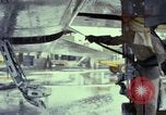 Image of Vietnamese contractor personnel clean F-100D airplane Vietnam, 1966, second 36 stock footage video 65675024991