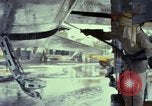 Image of Vietnamese contractor personnel clean F-100D airplane Vietnam, 1966, second 37 stock footage video 65675024991