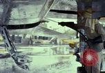 Image of Vietnamese contractor personnel clean F-100D airplane Vietnam, 1966, second 38 stock footage video 65675024991