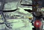 Image of Vietnamese contractor personnel clean F-100D airplane Vietnam, 1966, second 39 stock footage video 65675024991