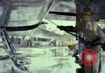 Image of Vietnamese contractor personnel clean F-100D airplane Vietnam, 1966, second 40 stock footage video 65675024991