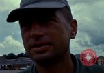 Image of Vietnamese contractor personnel clean F-100D airplane Vietnam, 1966, second 42 stock footage video 65675024991