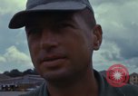 Image of Vietnamese contractor personnel clean F-100D airplane Vietnam, 1966, second 43 stock footage video 65675024991