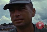 Image of Vietnamese contractor personnel clean F-100D airplane Vietnam, 1966, second 45 stock footage video 65675024991