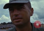 Image of Vietnamese contractor personnel clean F-100D airplane Vietnam, 1966, second 46 stock footage video 65675024991