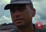 Image of Vietnamese contractor personnel clean F-100D airplane Vietnam, 1966, second 47 stock footage video 65675024991