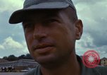 Image of Vietnamese contractor personnel clean F-100D airplane Vietnam, 1966, second 49 stock footage video 65675024991