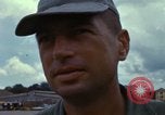 Image of Vietnamese contractor personnel clean F-100D airplane Vietnam, 1966, second 50 stock footage video 65675024991