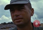 Image of Vietnamese contractor personnel clean F-100D airplane Vietnam, 1966, second 51 stock footage video 65675024991