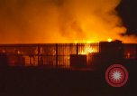 Image of Fires rage and aircraft are destroyed from rocket attack Vietnam, 1969, second 12 stock footage video 65675024997