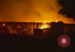 Image of Fires rage and aircraft are destroyed from rocket attack Vietnam, 1969, second 13 stock footage video 65675024997