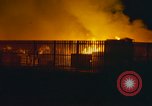 Image of Fires rage and aircraft are destroyed from rocket attack Vietnam, 1969, second 14 stock footage video 65675024997