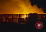 Image of Fires rage and aircraft are destroyed from rocket attack Vietnam, 1969, second 15 stock footage video 65675024997