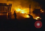 Image of Fires rage and aircraft are destroyed from rocket attack Vietnam, 1969, second 16 stock footage video 65675024997