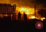 Image of Fires rage and aircraft are destroyed from rocket attack Vietnam, 1969, second 18 stock footage video 65675024997