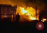 Image of Fires rage and aircraft are destroyed from rocket attack Vietnam, 1969, second 21 stock footage video 65675024997