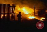 Image of Fires rage and aircraft are destroyed from rocket attack Vietnam, 1969, second 22 stock footage video 65675024997