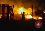 Image of Fires rage and aircraft are destroyed from rocket attack Vietnam, 1969, second 23 stock footage video 65675024997
