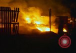 Image of Fires rage and aircraft are destroyed from rocket attack Vietnam, 1969, second 25 stock footage video 65675024997