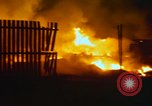 Image of Fires rage and aircraft are destroyed from rocket attack Vietnam, 1969, second 26 stock footage video 65675024997