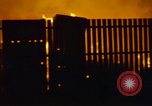 Image of Fires rage and aircraft are destroyed from rocket attack Vietnam, 1969, second 28 stock footage video 65675024997